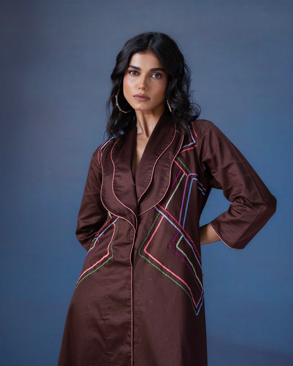 Straight fit one piece dress with curved lapel collar and thread